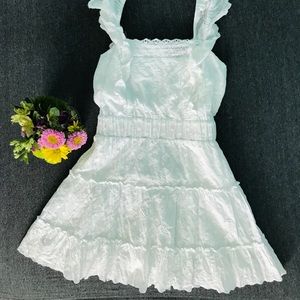 Lulus’s Sing Me Something White Lace Mini Dress